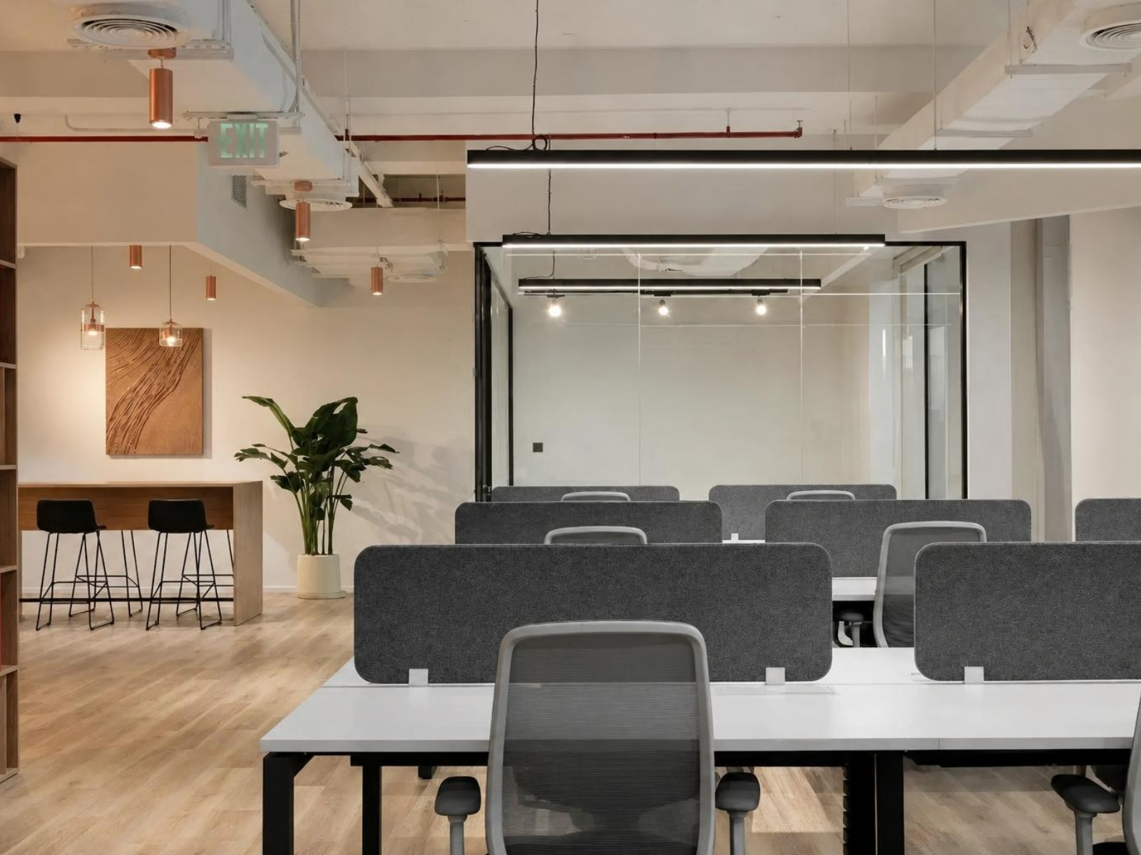 Furnished office for rent in Emaar Business Park with desks and glass meeting room
