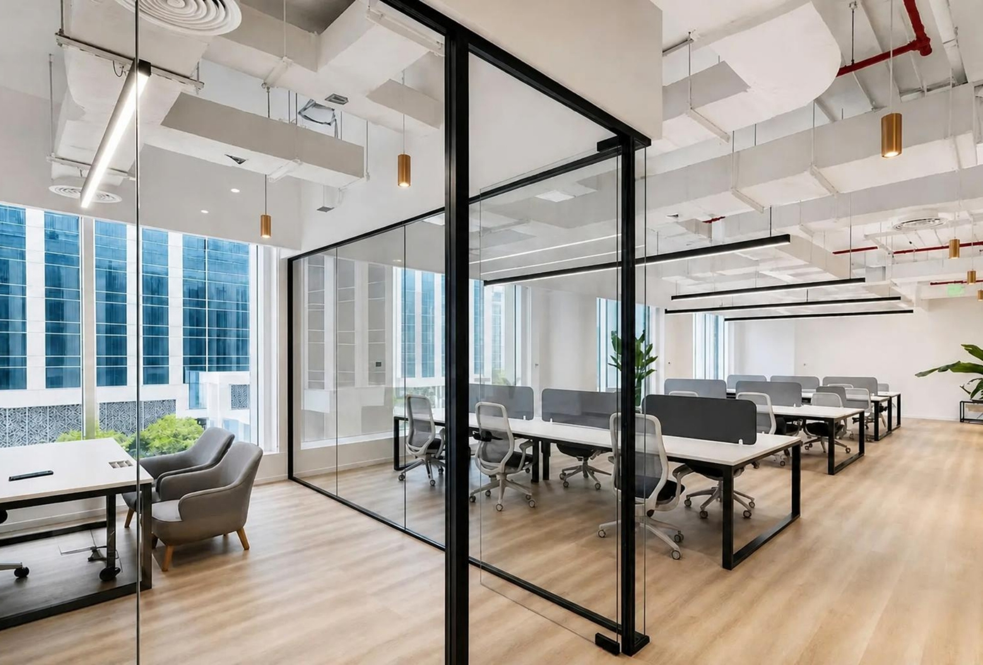 Glass partitioned work area in the Emaar Square Building 3 office