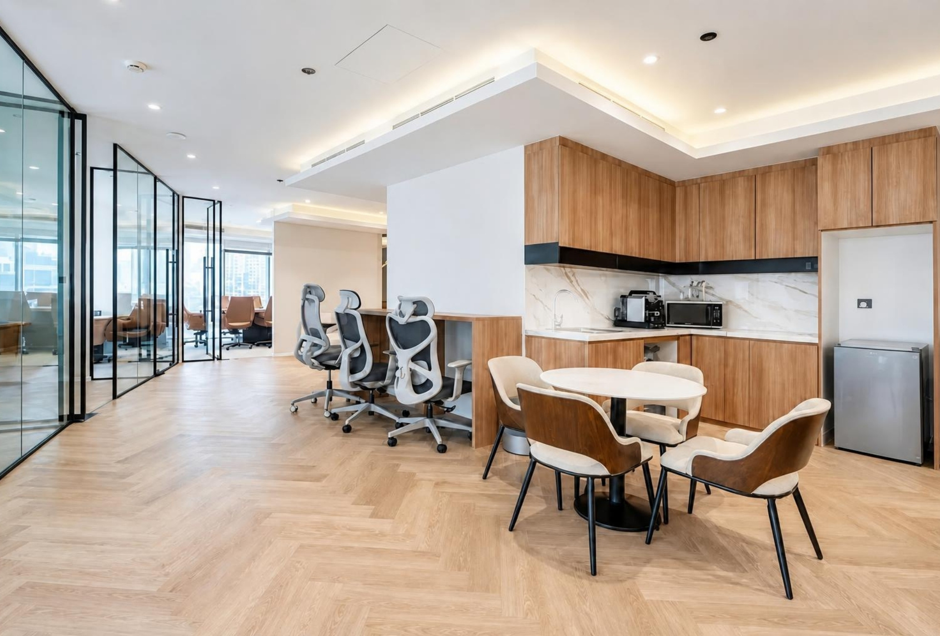 Pantry and open desks in the Magnum Opus Bay office