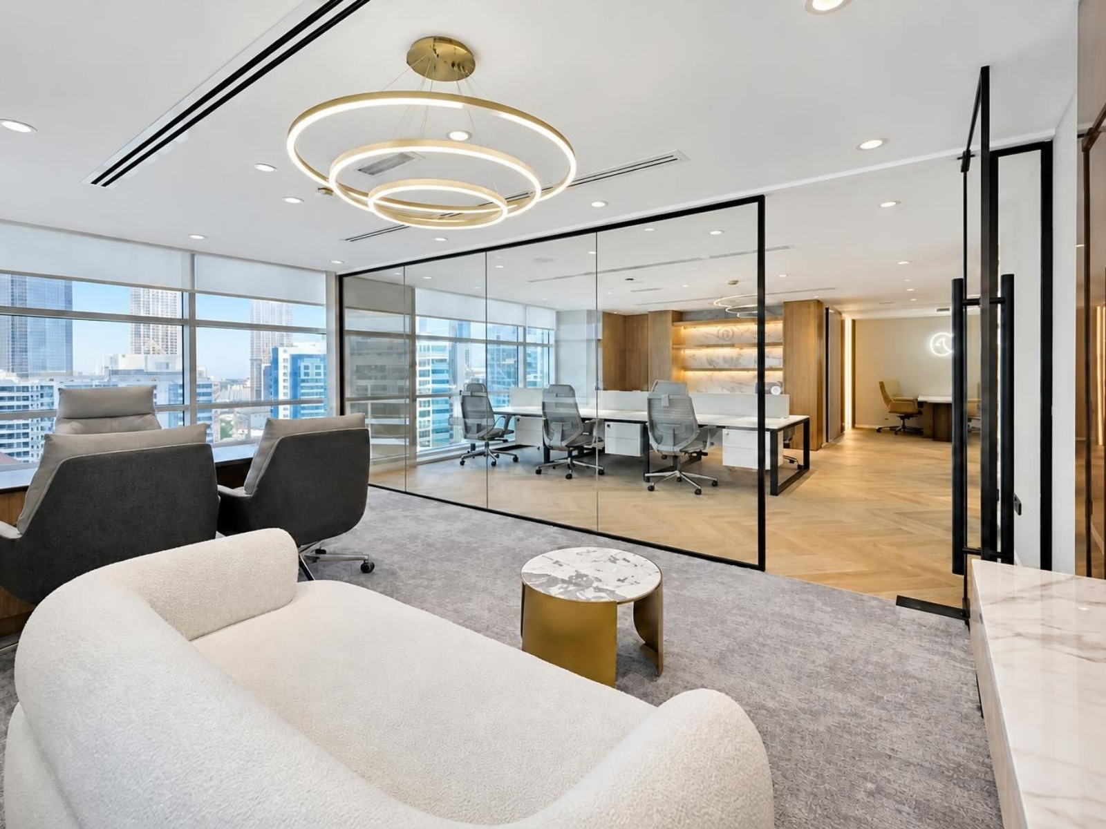 Office for rent in Magnum Opus Bay, bright lounge and glass-fronted office area