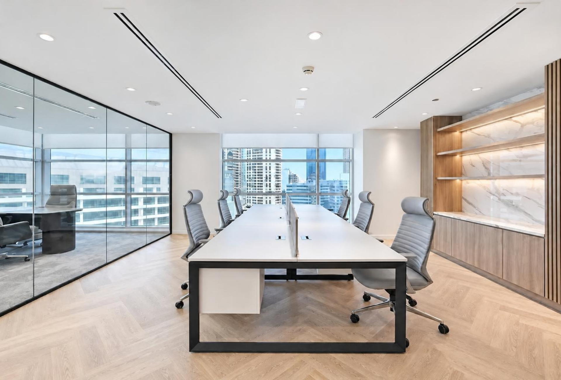 Workstation area with city view in Magnum Opus Bay office
