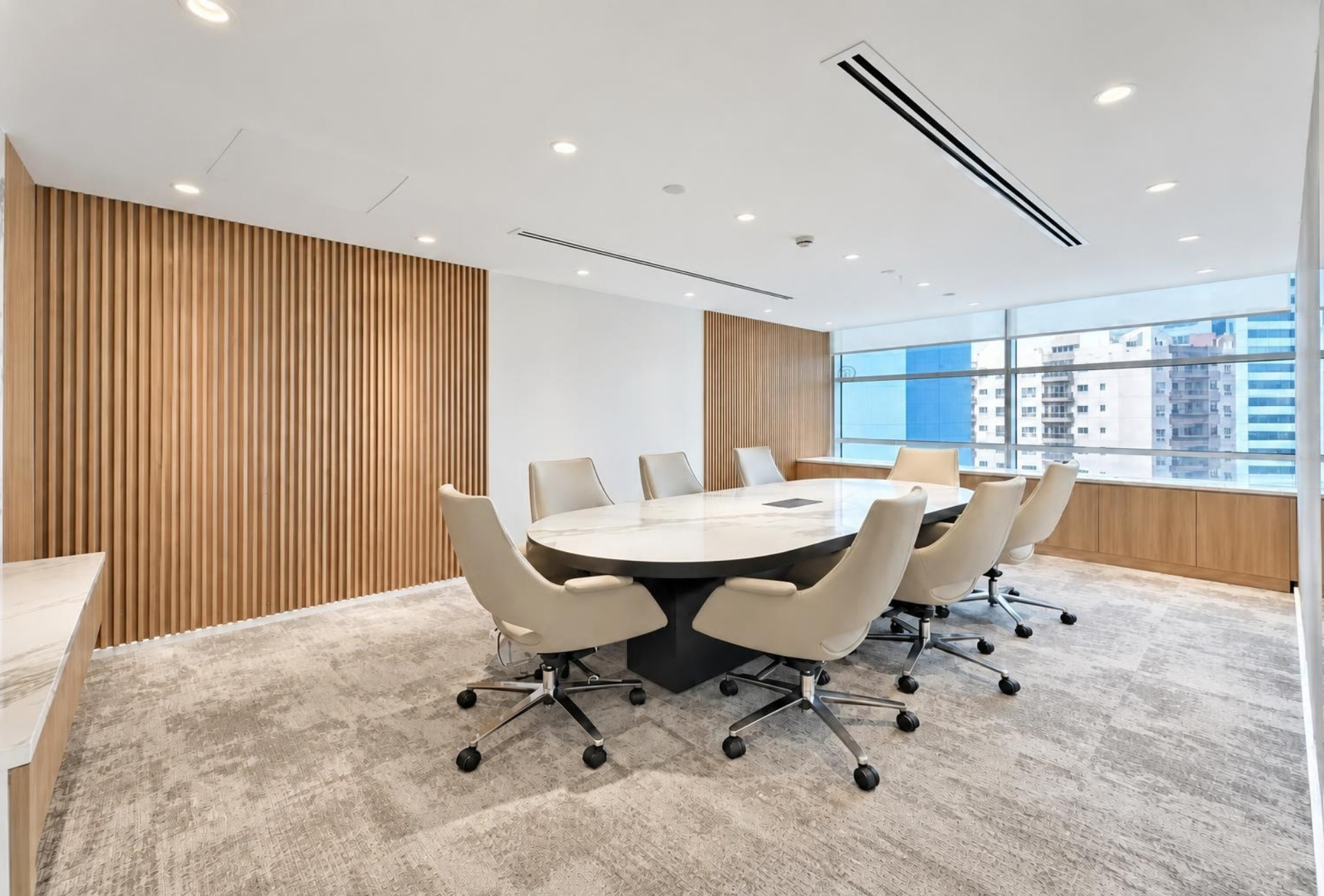 Boardroom with timber slat wall in Magnum Opus Bay office