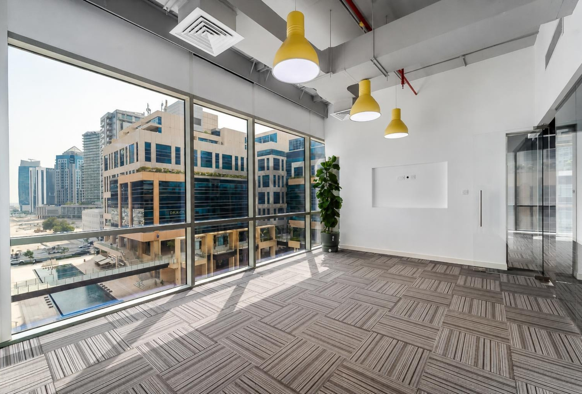 Office with floor to ceiling windows in Bay Square Business Bay