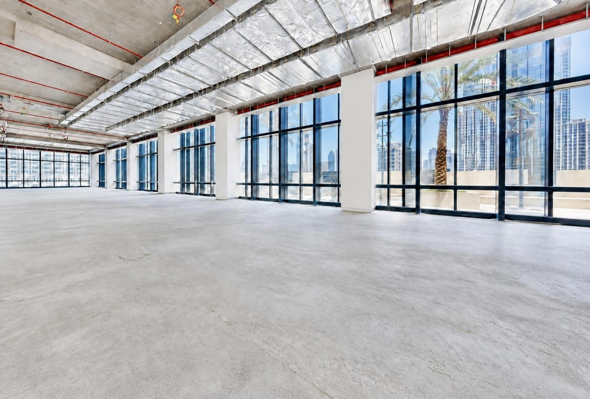 Open floor plate with tall windows in Boulevard Plaza 1