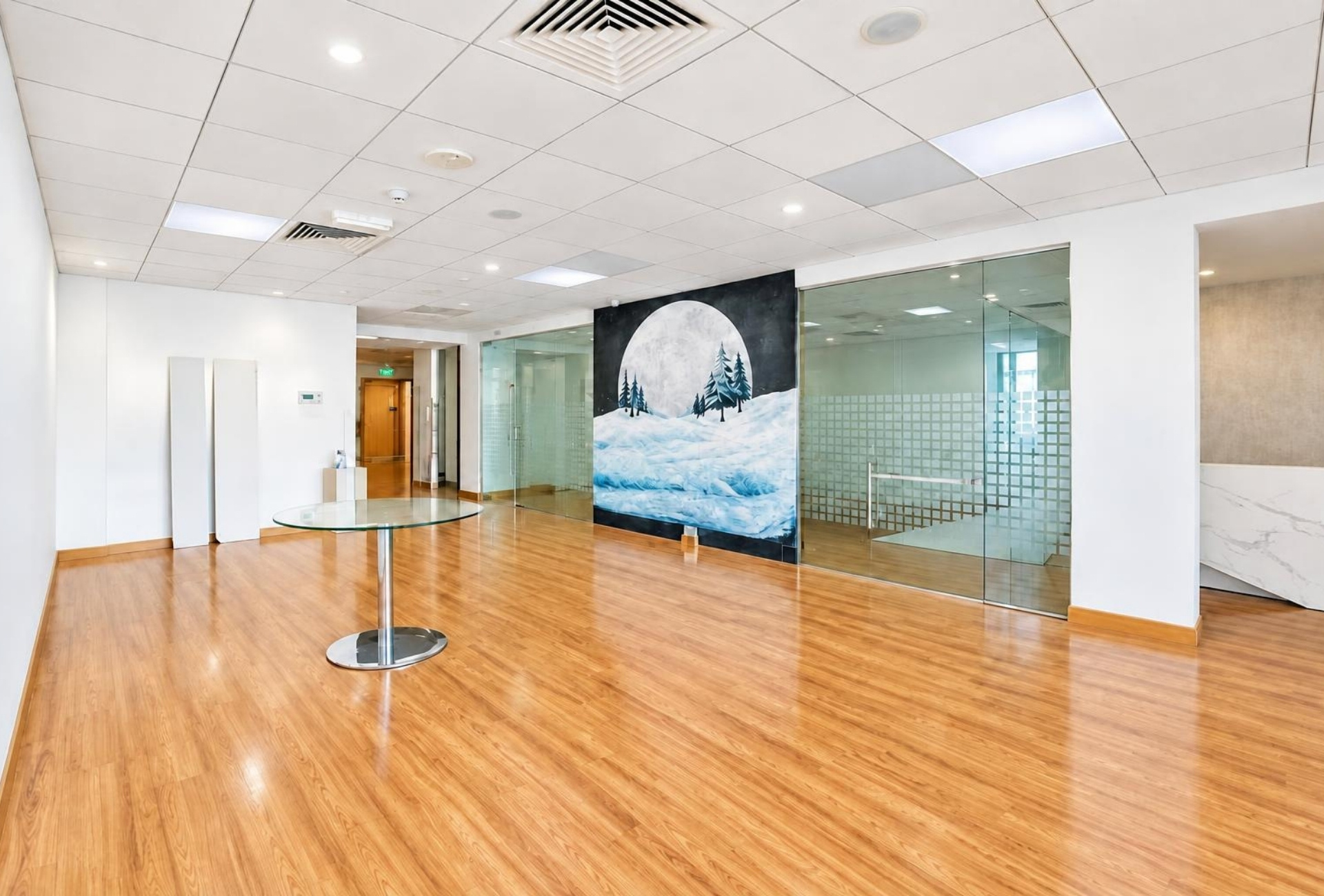 Large open office floor with glass partitions in Rigga Business Center