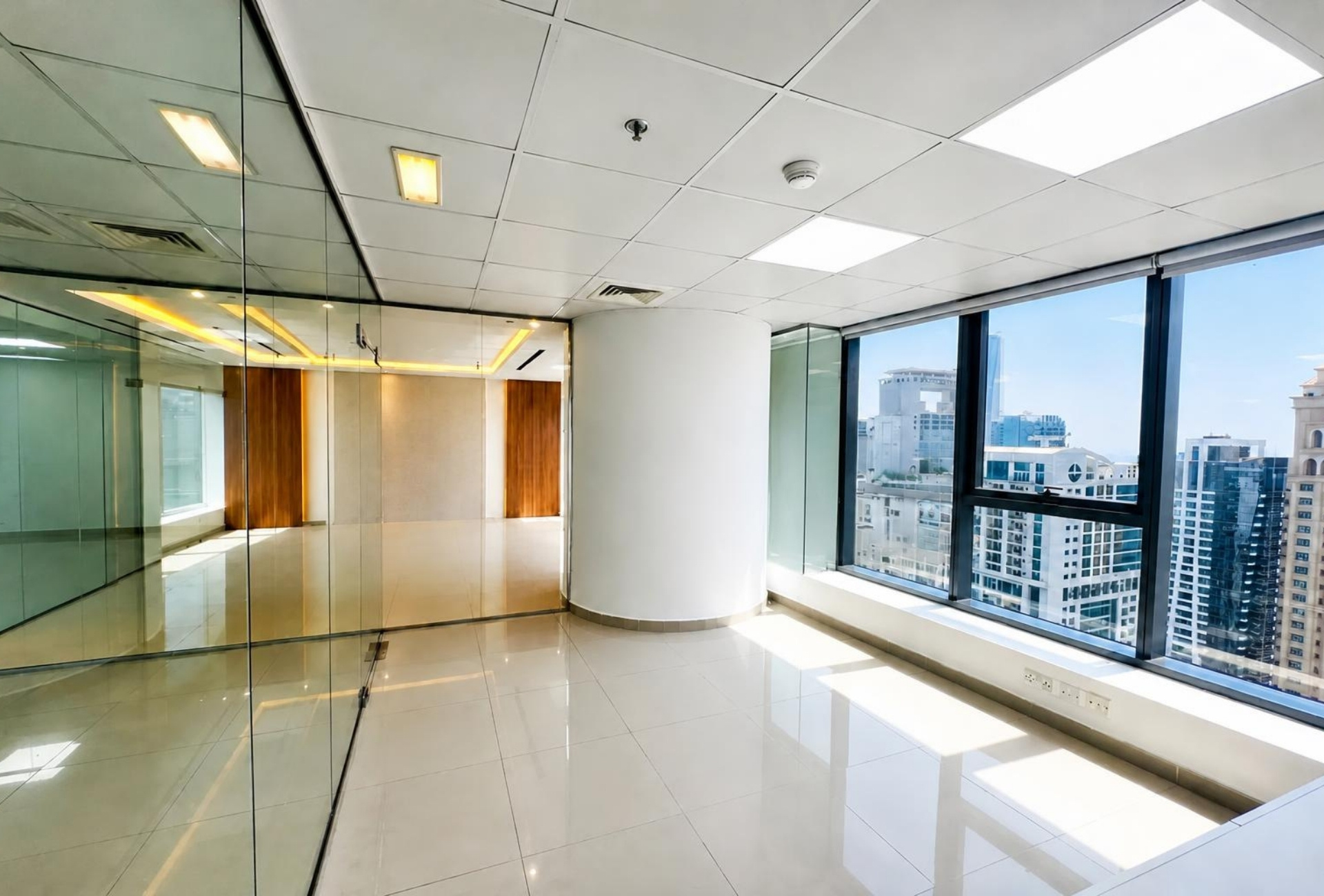 Glass partitioned area and column in the Platinum Tower office