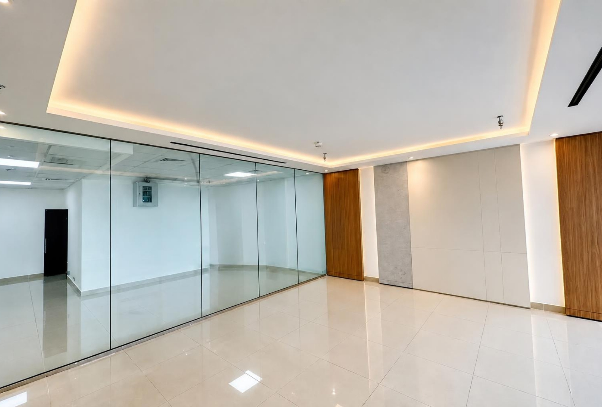 Glass wall meeting space in the Platinum Tower office