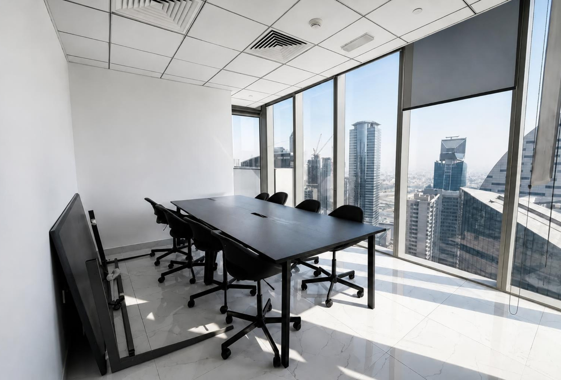 The Prism Business Bay meeting room with skyline view